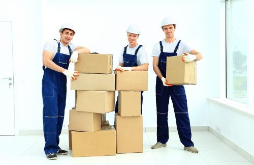 Fragile items and furniture being packed for a Mitcham move